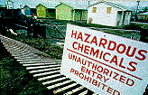 photo of a sign that reads: HAZARDOUS CHEMICALS