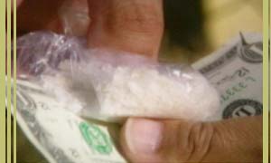 photo of meth and a dollar bill