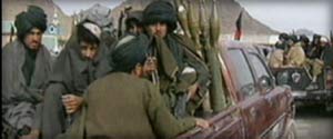 afghani soldiers in a pickup truck