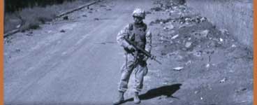 photo of a soldier on a road