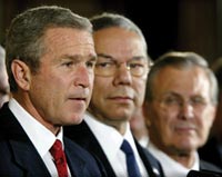 president george w. bush with secretary of state colin powell and defense secretary donald rumsfeld