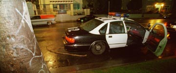 photo of a police car at night