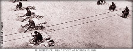 prisoners breaking rocks at robben island