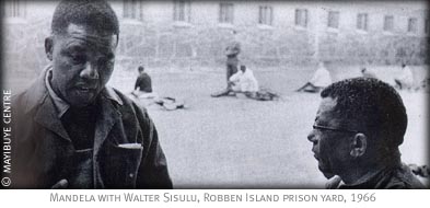 Mandela with Walter Sisulu, Robben Island prison yard, 1966