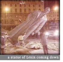 a statue of stalin coming down