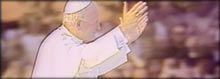 pope with his arms raised