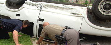 photo of an overturned suv