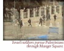 Israeli soldiers pursue Palestinians through Manger Square