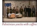 Palestinian youths with coffins